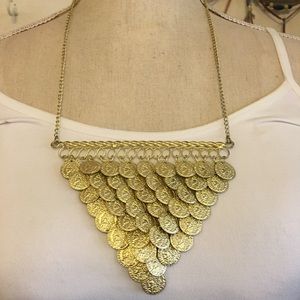 Tiered gold tone faux French coin necklace